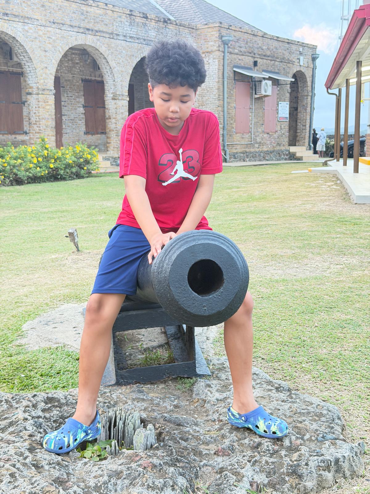 Sitting on the old cannon